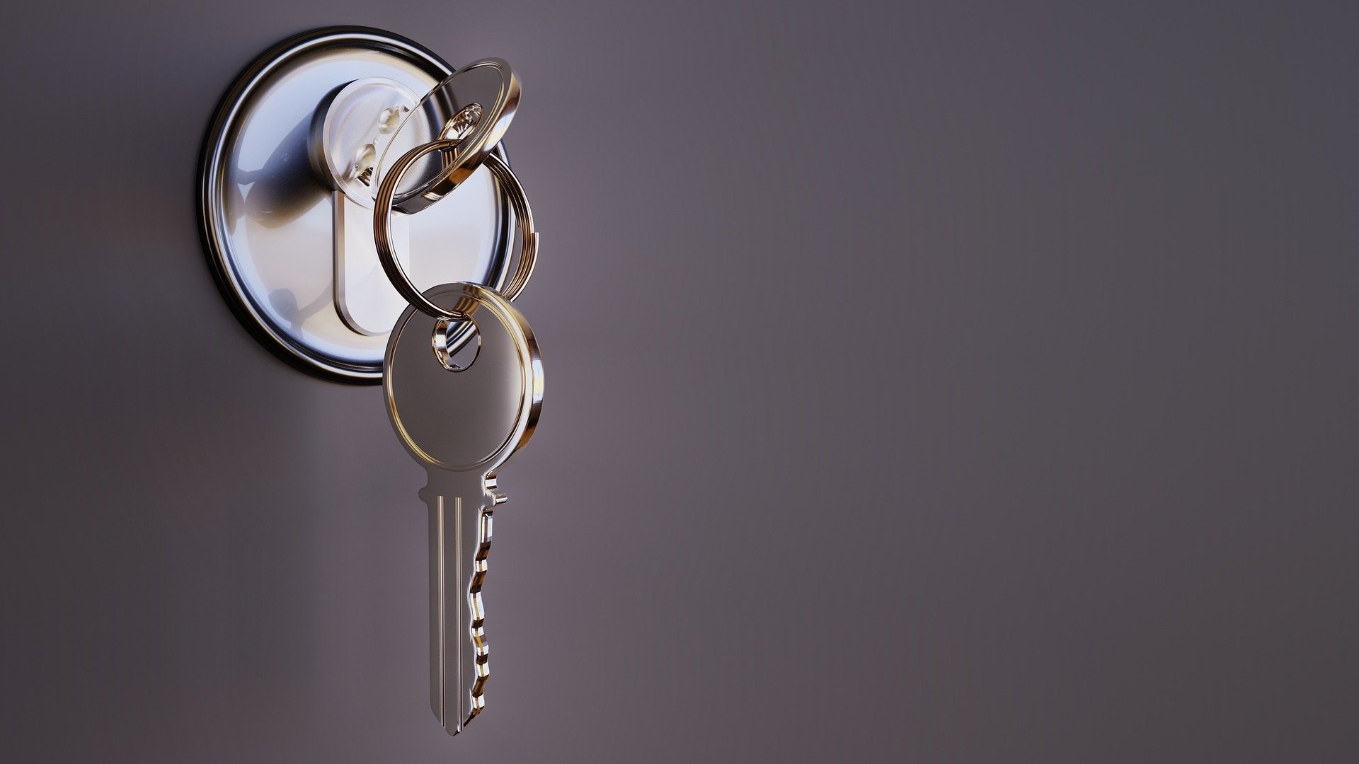 Bild föreställande nycklar i ett dörrlås